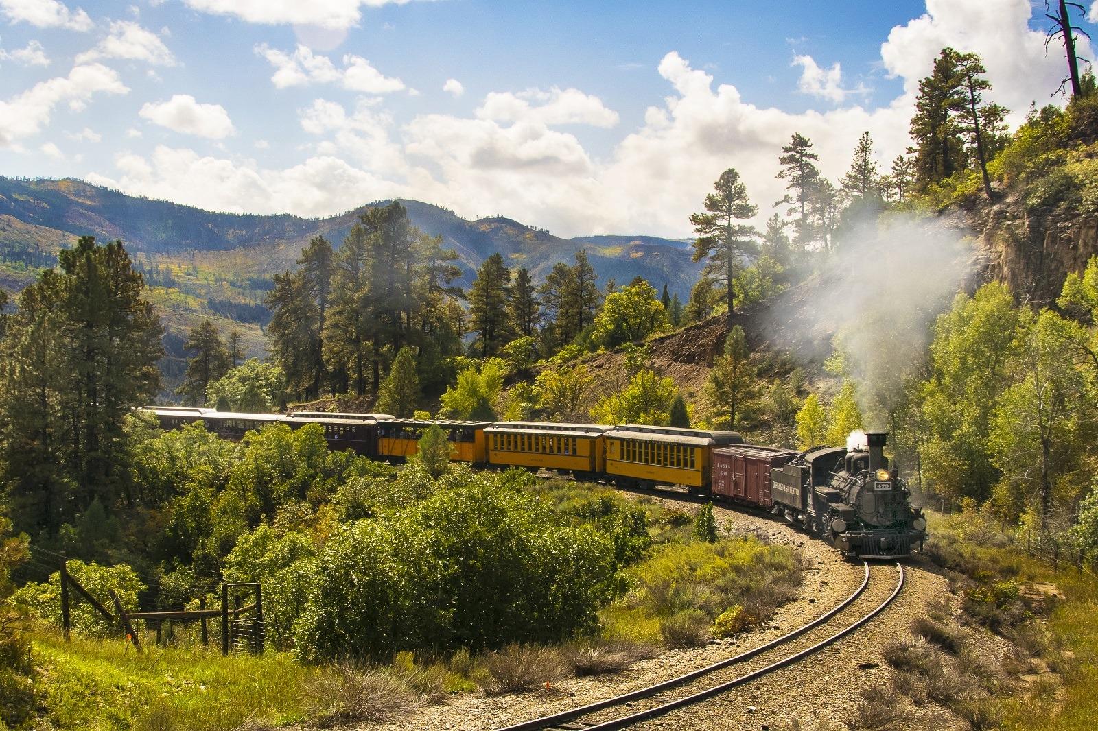Durango Silverton steam train winding through the San Juan Mountains