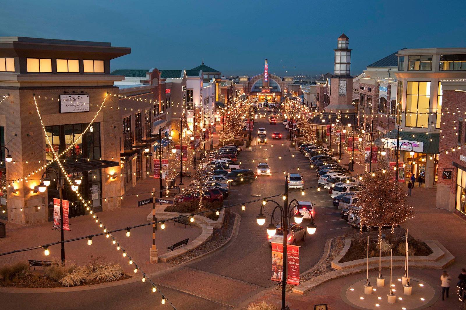 Southlands shopping district in Aurora, Colorado lit up at dusk during the holidays