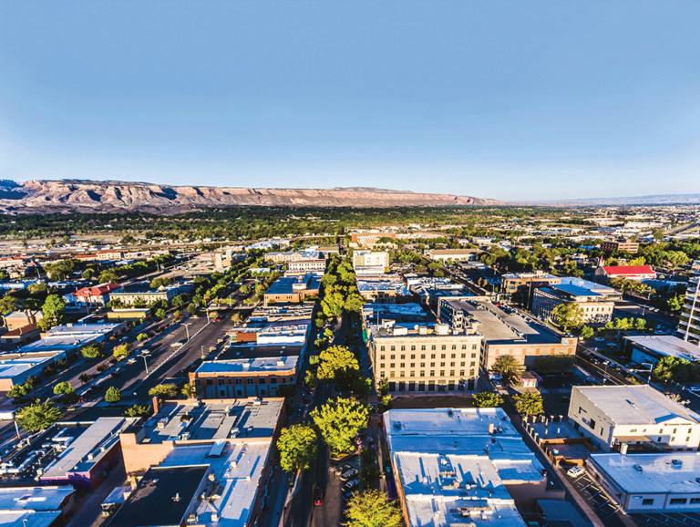 Aerial view of downtown Grand Junction with the Bookcliffs in the distance